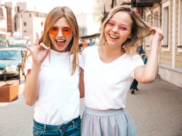 portrait two young beautiful blond smiling hipster girls trendy summer white t shirt clothes positive models having fun sunglasses hugging 1